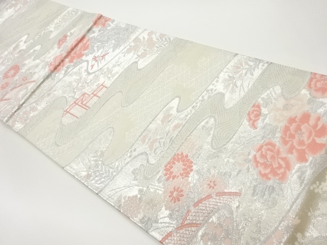 流水に蛇籠・花々模様織出し袋帯